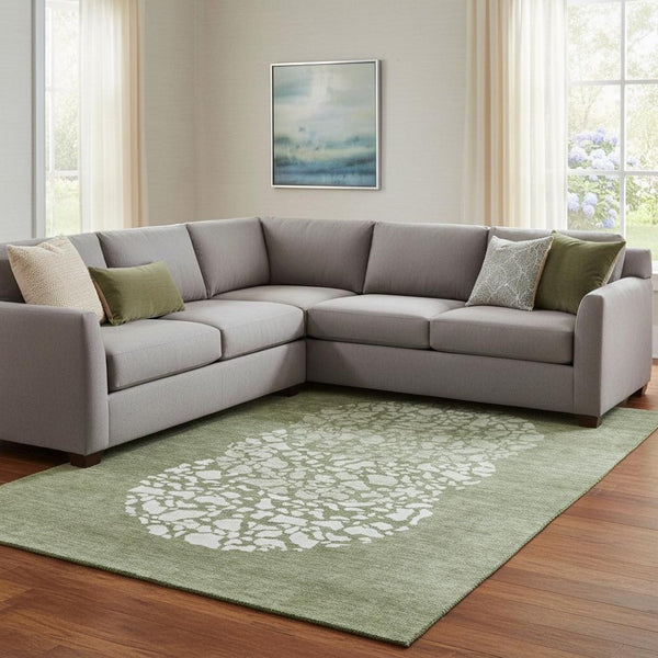 HomeRoots 9' X 12' Olive Green & Ivory Abstract Area Rug - Washable, UV Protected, Durable for High-Traffic Spaces 653589