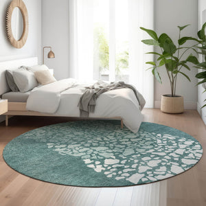 HomeRoots 8' Teal and Ivory Abstract Round Rug - Washable, UV-Protected, Durable for High-Traffic Areas 653599