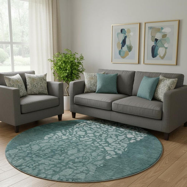 HomeRoots 8' Teal and Ivory Abstract Round Rug - Washable, UV-Protected, Durable for High-Traffic Areas 653599
