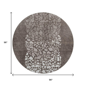 HomeRoots 8' Taupe and Ivory Abstract Washable Round Rug - UV Protected, Durable, Easy Care for Every Room 653605