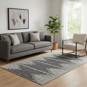 HomeRoots 5' X 8' Charcoal & Ivory Abstract Area Rug - Washable, Stain Resistant, UV Protected for High Traffic Spaces 653673