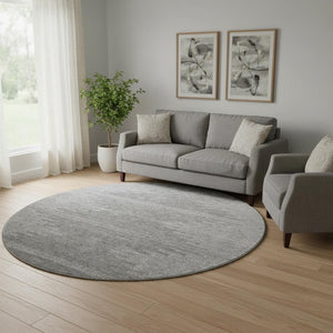 HomeRoots 8' Gray And Ivory Abstract Round Rug - Washable, UV-Protected, Soft Polyester for High-Traffic Areas 653704