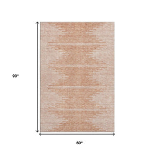 HomeRoots 5' X 8' Salmon and Ivory Abstract Area Rug – Stylish, Washable, UV-Protected for Homes with Pets! 653715