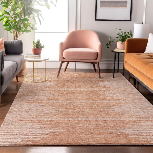 HomeRoots 10' X 14' Salmon and Ivory Abstract Area Rug - Washable, UV-Protected, Perfect for Modern Living Spaces 653719