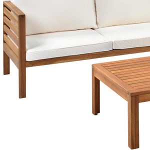 HomeRoots Four-Piece Solid Wood Sectional Seating Group with Cushions & Coffee Table - Perfect for Outdoor Relaxation! 653926
