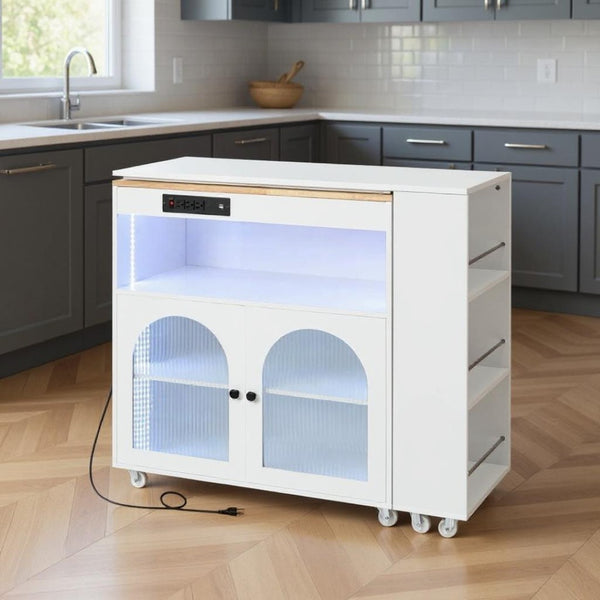 HomeRoots 33" Rolling White Wood Barn Door Kitchen Island with Storage, USB Ports & Farmhouse Charm 654064