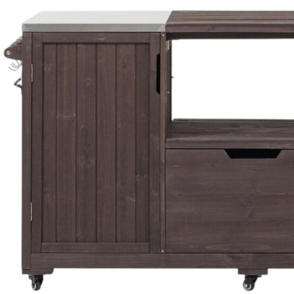 HomeRoots 67" Rustic Brown Wood Barn Door Rolling Kitchen Island with Ample Storage & Mobility Features 654076