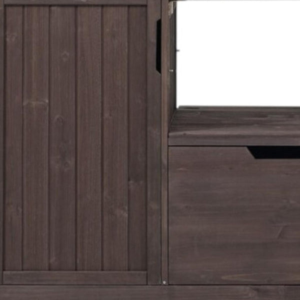 HomeRoots 67" Rustic Brown Wood Barn Door Rolling Kitchen Island with Ample Storage & Mobility Features 654076