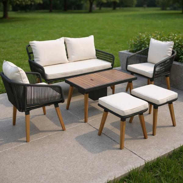 HomeRoots Four-Piece Wicker Seating Group with Beige Cushions & Cooler-Insert Table – Stylish Outdoor Comfort 654086