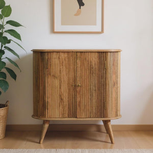 HomeRoots 32" Brown Solid Mango Wood Oval Cabinet with Ribbed Texture - Stylish Storage Solution for Any Room 654267