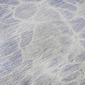 HomeRoots 8' Lavender and Ivory Abstract Round Rug - Washable, Stain-Resistant, UV Protected for Living Spaces 654593