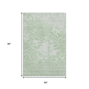 HomeRoots 5' X 8' Mint Green and Ivory Abstract Area Rug - Modern, Stain-Resistant with UV Protection! 654598