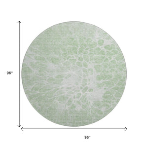 HomeRoots 8' Mint Green and Ivory Abstract Washable Round Rug – Durable, Stain-Resistant, UV Protected Style 654599