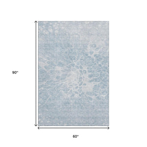 HomeRoots 5' X 8' Sky Blue & Ivory Abstract Area Rug - Washable, UV-Protected, Durable for Busy Homes 654610