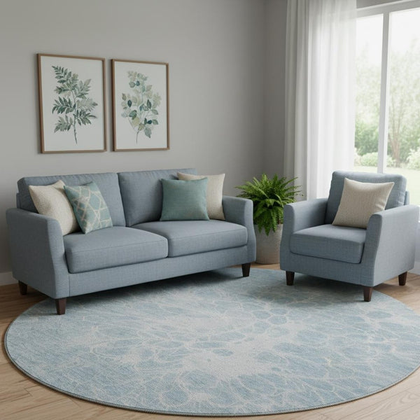 HomeRoots 8' Sky Blue and Ivory Abstract Washable Round Rug - UV Protected, Modern Design for Families 654611