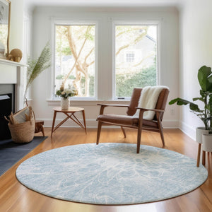 HomeRoots 8' Sky Blue and Ivory Abstract Washable Round Rug - UV Protected, Modern Design for Families 654611