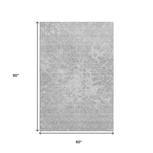 HomeRoots 5' X 8' Abstract Silver and Gray Washable Area Rug - Durable, Stain Resistant, UV Protected Design! 654616