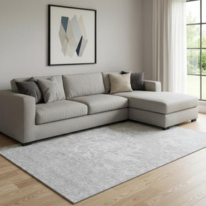 HomeRoots 9' X 12' Silver and Gray Abstract Area Rug - Washable, UV Protected, Stylish for High-Traffic Spaces 654619