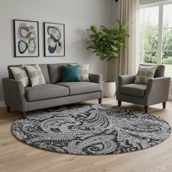 HomeRoots 8' Black And Ivory Paisley Round Rug – Washable, UV Protected, Stain-Resistant, Perfect for Pets! 654635