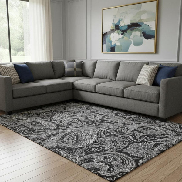 HomeRoots 8' X 10' Black And Ivory Paisley Area Rug - Washable, Stain-Resistant, UV Protected for Any Room 654636