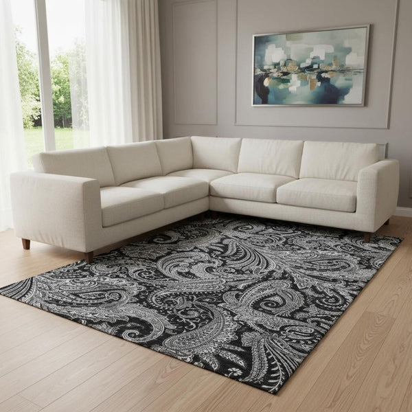 HomeRoots 10' X 14' Black and Ivory Paisley Area Rug - Washable, UV-Protected, Perfect for Family Homes! 654638