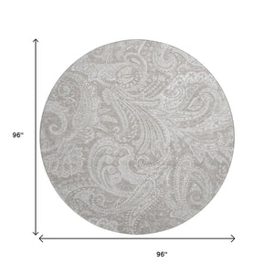 HomeRoots 8' Taupe and Ivory Paisley Washable Round Rug – Durable, Stain-Resistant with UV Protection for Homes 654683