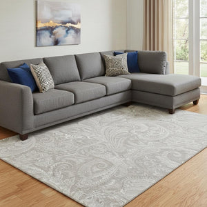 HomeRoots 10' X 14' Stylish Taupe and Ivory Paisley Area Rug - Washable, UV Protected for High-Traffic Areas 654686