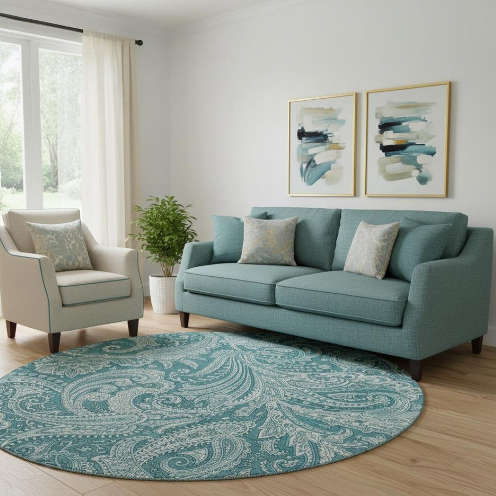 HomeRoots 8' Turquoise and Ivory Paisley Washable Round Rug with UV Protection for Indoor and Outdoor Use 654689