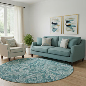 HomeRoots 8' Turquoise and Ivory Paisley Washable Round Rug with UV Protection for Indoor and Outdoor Use 654689