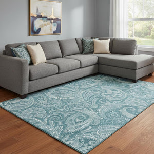 HomeRoots 10' X 14' Turquoise & Ivory Paisley Washable Area Rug with UV Protection for High-Traffic Spaces 654692