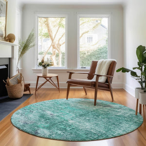 HomeRoots 8' Teal and Ivory Abstract Washable Round Rug - Durable, Stain-Resistant with UV Protection for All Spaces 654769