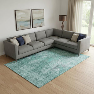 HomeRoots 9' X 12' Teal and Ivory Abstract Area Rug - Washable, UV-Protected, Perfect for High-Traffic Spaces 654771