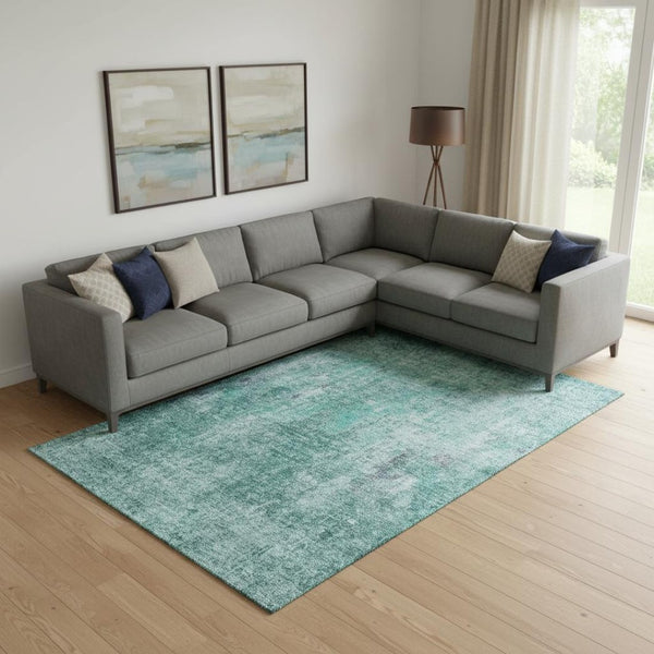 HomeRoots 9' X 12' Teal and Ivory Abstract Area Rug - Washable, UV-Protected, Perfect for High-Traffic Spaces 654771