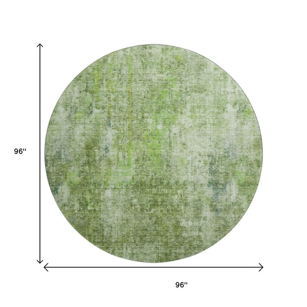 HomeRoots 8' Olive Green Abstract Round Rug - Washable, UV Protected, Stain Resistant for Modern Spaces 654805