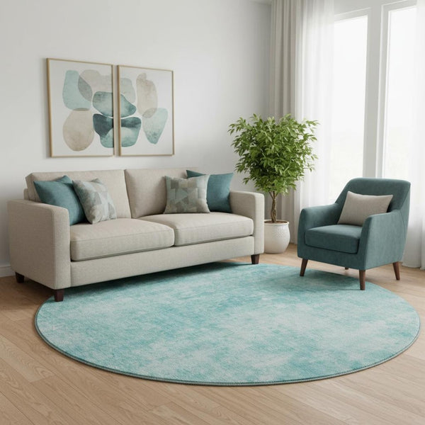 HomeRoots 8' Teal and Ivory Abstract Round Rug - Washable, UV-Protected, Perfect for High-Traffic Homes 654811