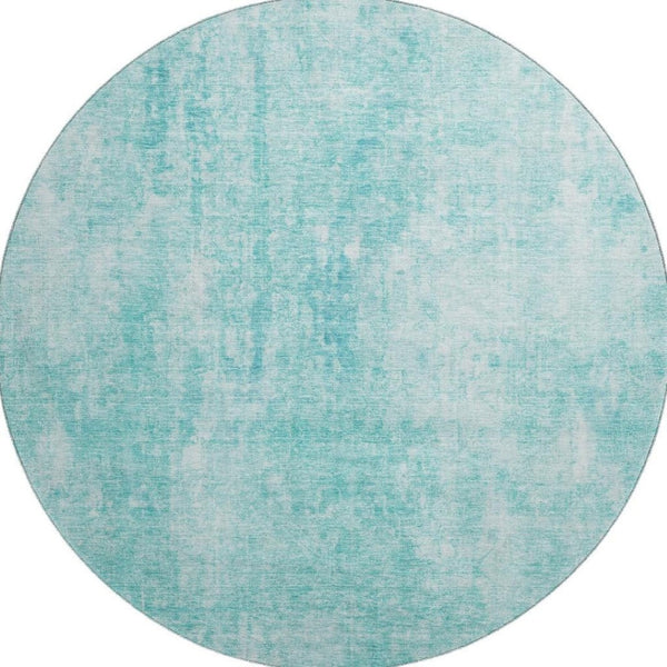 HomeRoots 8' Teal and Ivory Abstract Round Rug - Washable, UV-Protected, Perfect for High-Traffic Homes 654811