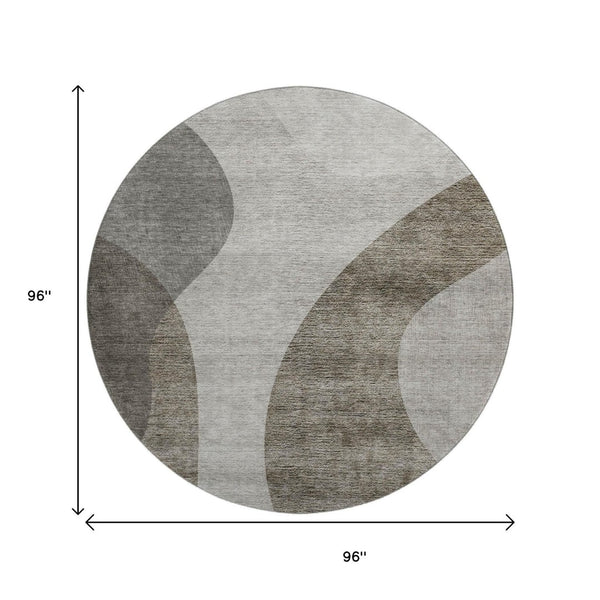 HomeRoots 8' Taupe and Beige Geometric Round Rug - Washable, UV-Protected, Family-Friendly Design for Cozy Spaces 654853