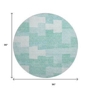 HomeRoots 8' Teal and Ivory Geometric Washable Round Rug - Stylish, Durable, and UV Protected for Modern Homes 654955