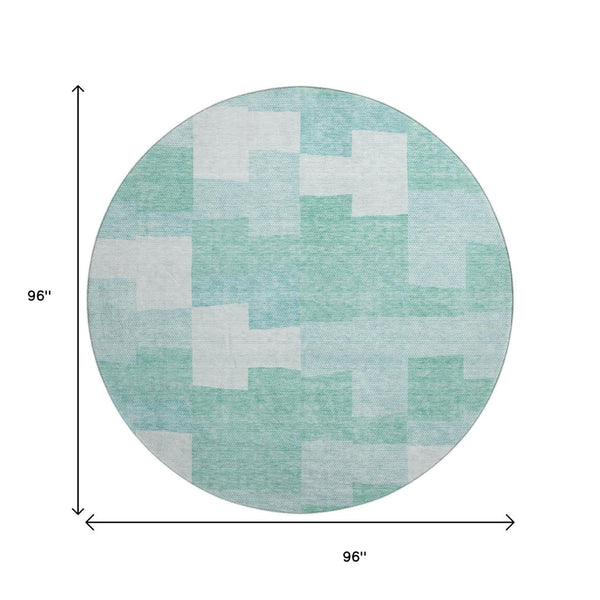HomeRoots 8' Teal and Ivory Geometric Washable Round Rug - Stylish, Durable, and UV Protected for Modern Homes 654955