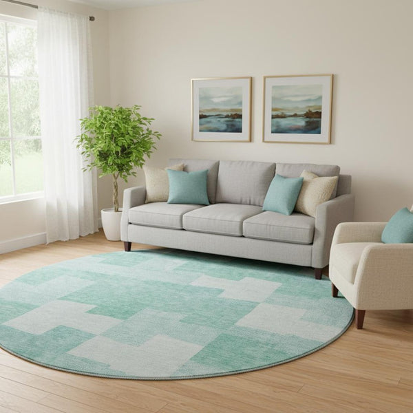 HomeRoots 8' Teal and Ivory Geometric Washable Round Rug - Stylish, Durable, and UV Protected for Modern Homes 654955