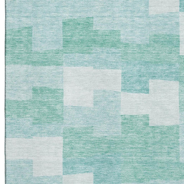 HomeRoots 9' X 12' Teal And Ivory Geometric Area Rug – Washable, UV Protected, Stylish for High-Traffic Spaces 654957