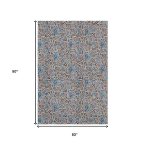 HomeRoots 5' X 8' Coffee And Blue Floral Area Rug - Washable, UV-Protected, Stain-Resistant for Everyday Use 654990