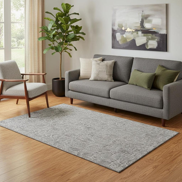 HomeRoots 5' X 8' Silver and Gray Floral Area Rug - Washable, Stain-Resistant, UV Protected for Everyday Use 655014