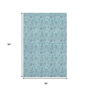 HomeRoots 5' Aqua and Silver Floral Area Rug - Washable, Stain Resistant, UV Protected for High-Traffic Spaces 655110