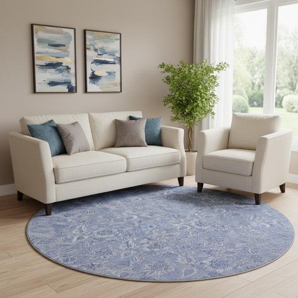 HomeRoots 8' Denim Blue Round Rug with Ivory Floral Design - Washable, UV Protected, Pet-Friendly Home Decor 655135