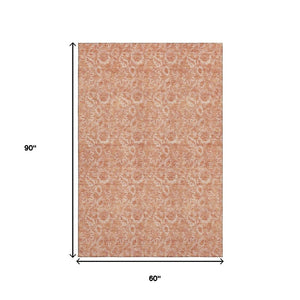 HomeRoots 5' X 8' Salmon Floral Washable Area Rug - Durable, UV-Protected, Easy-Care Design for High-Traffic Spaces 655146