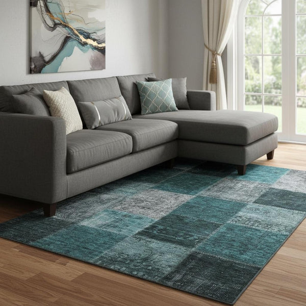 HomeRoots 8' X 10' Teal and Gray Patchwork Area Rug - Washable, Stain Resistant, UV Protected for High Traffic Areas 655208