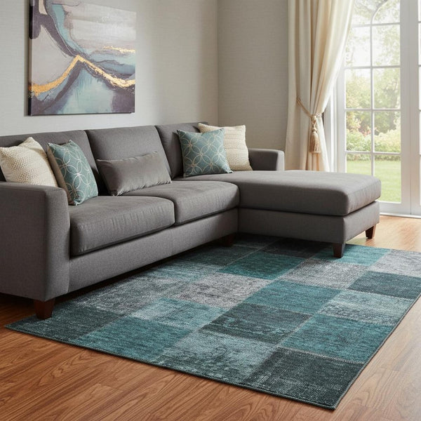 HomeRoots 9' X 12' Teal and Gray Patchwork Area Rug - Durable, Washable, UV-Protected for High-Traffic Spaces 655209