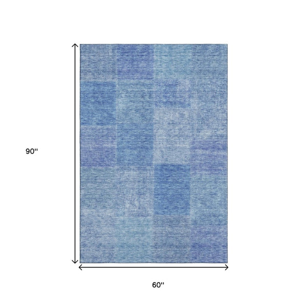 HomeRoots 5' X 8' Denim Blue & Ivory Patchwork Area Rug – Durable, Washable, UV-Protected for Modern Spaces 655224