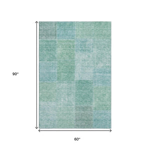 HomeRoots 5' X 8' Teal and Ivory Patchwork Area Rug - Washable, UV-Protected, Durable for High-Traffic Spaces 655236